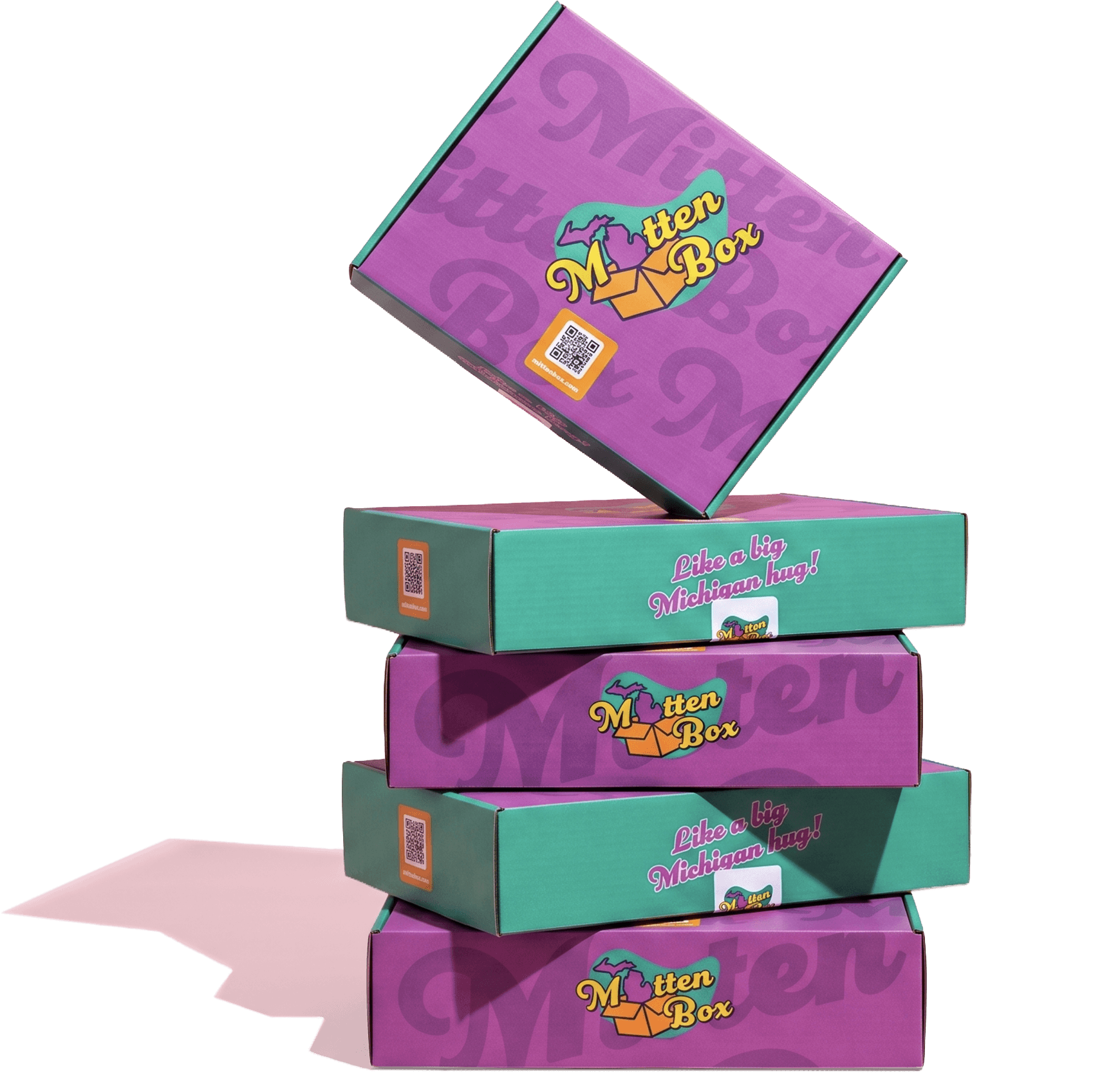 A playfully stacked pile of Mitten Box boxes.