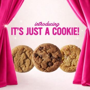 Three cookies being revealed behind a pink curtain.