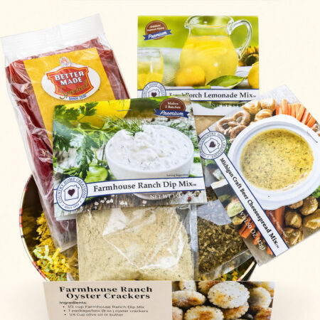 Tin filled with snack items including licorice and different dip mixes.
